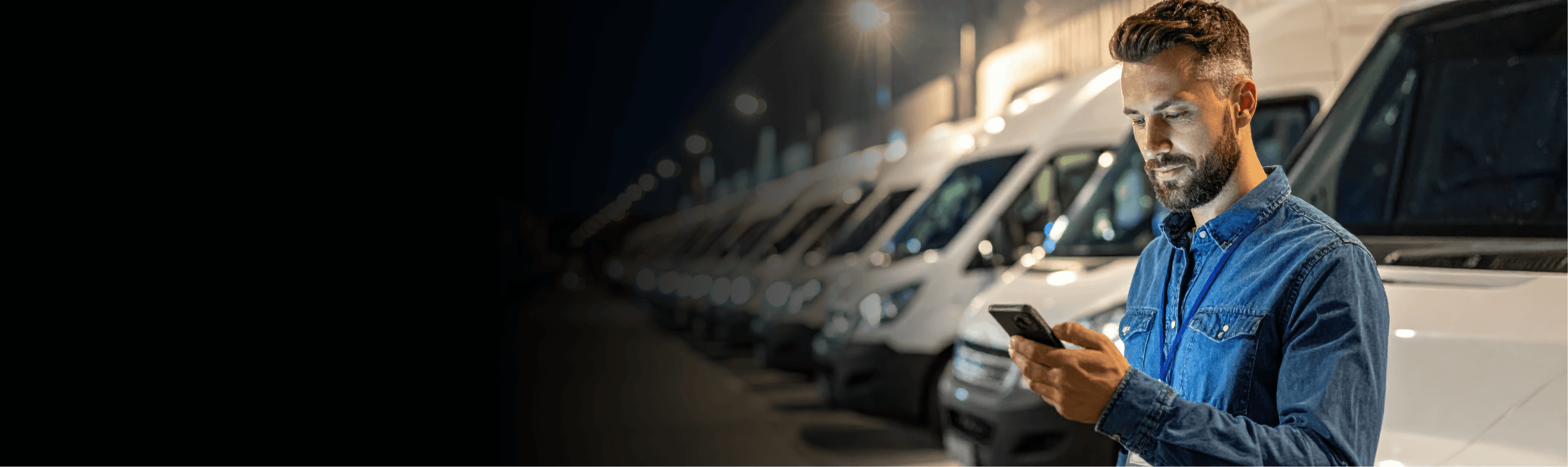 Fleet driver with phone at night