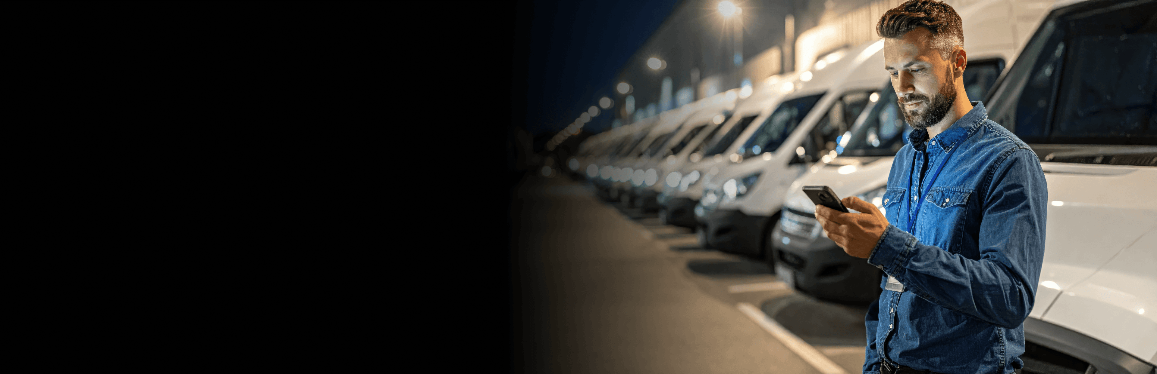 Fleet driver with phone at night