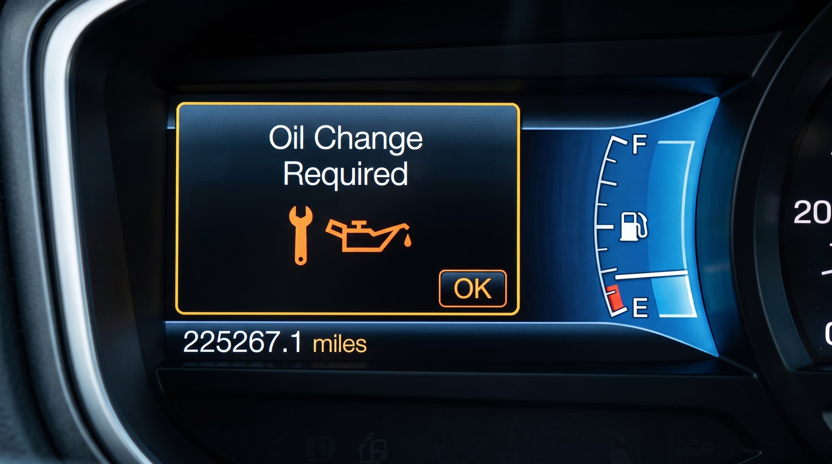 Oil change required message on a dashboard display